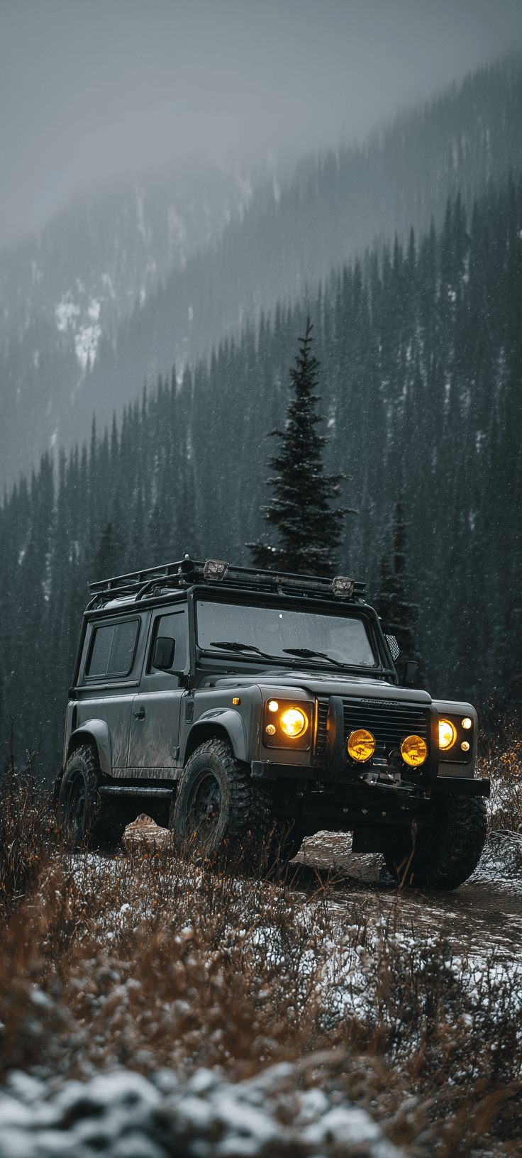 Matte Dark Green Land Rover Defender 110 Wallpaper – Rugged Mountain Adventure