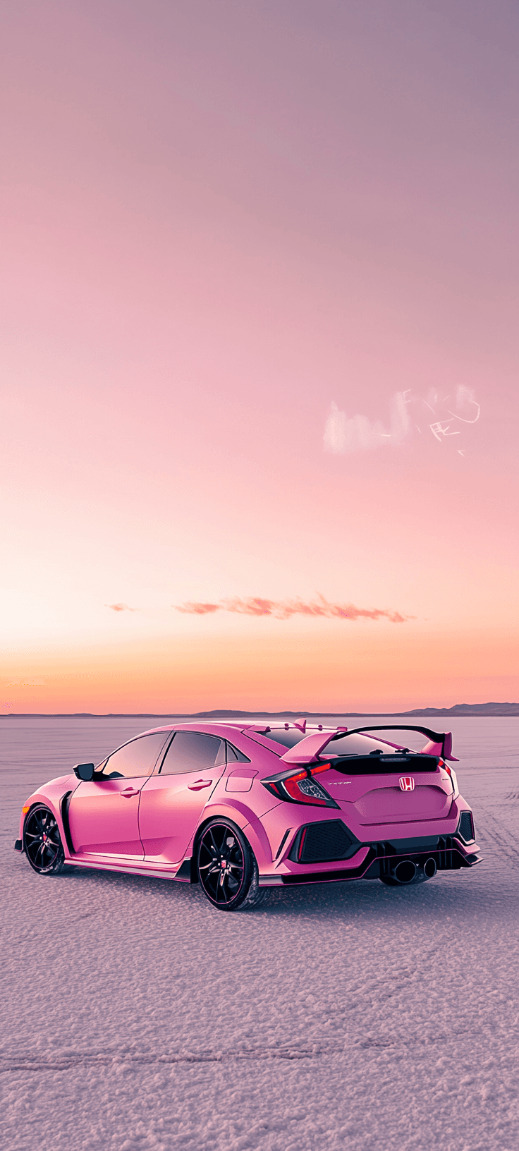 A pink sports car parked on an icy landscape with a sunset sky in the background.