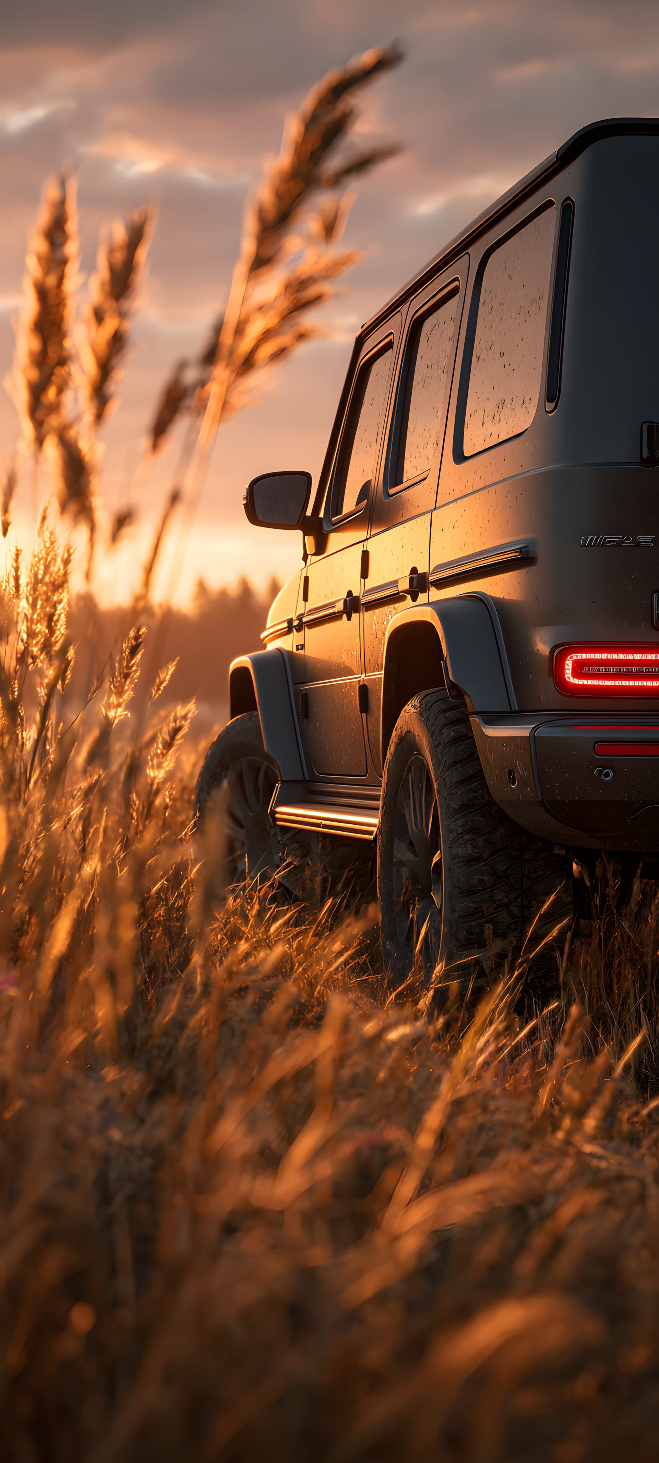 A rugged SUV parked in a field of golden wheat at sunset, with warm, golden hues and a tranquil atmosphere.